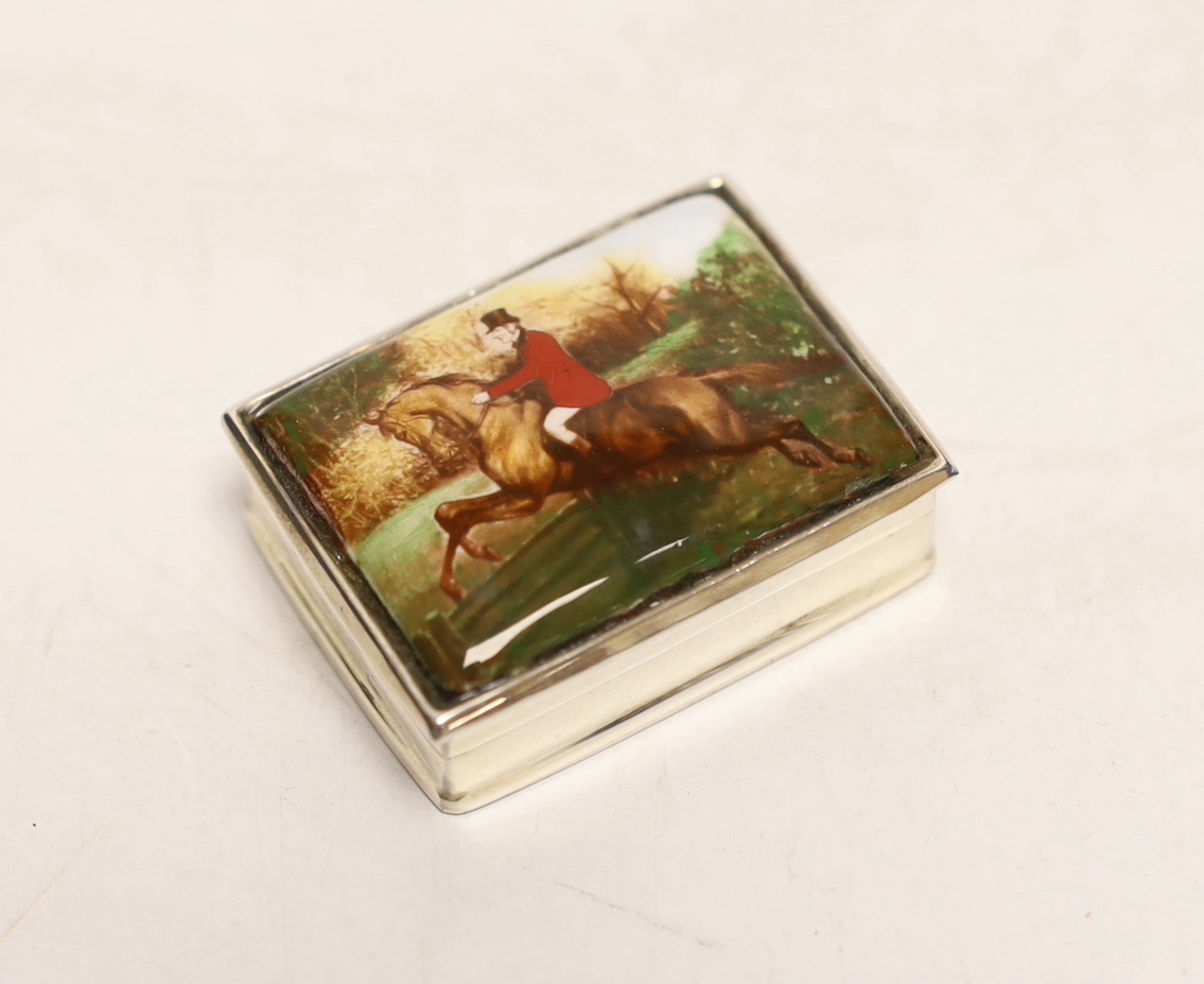 A modern 925 and enamel pill box, decorated with fox hunting scene, 36mm.